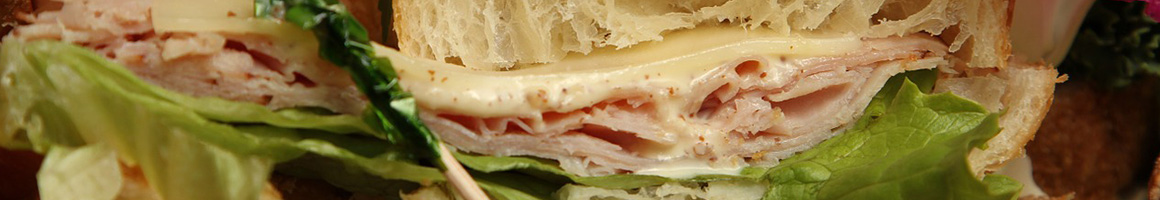 Eating Sandwich at Inner Bean Cafe restaurant in Augusta, GA.